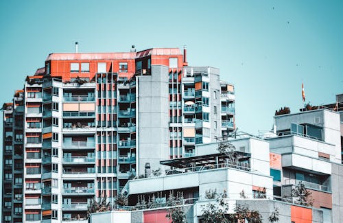Modern residential buildings in Bern, featuring glass windows and vibrant design.