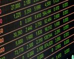 Detailed view of a stock market screen showing numbers and data, symbolizing financial trading.